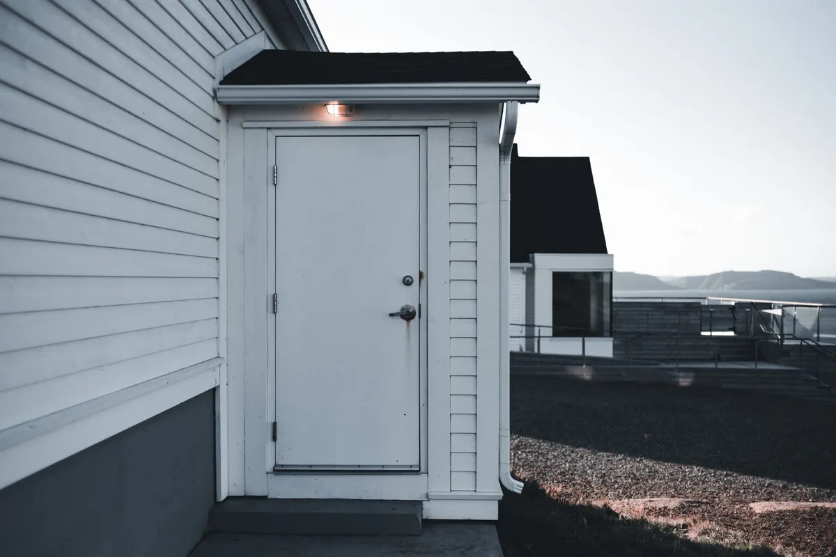 Soft washing service on a house exterior in Iowa City, Iowa