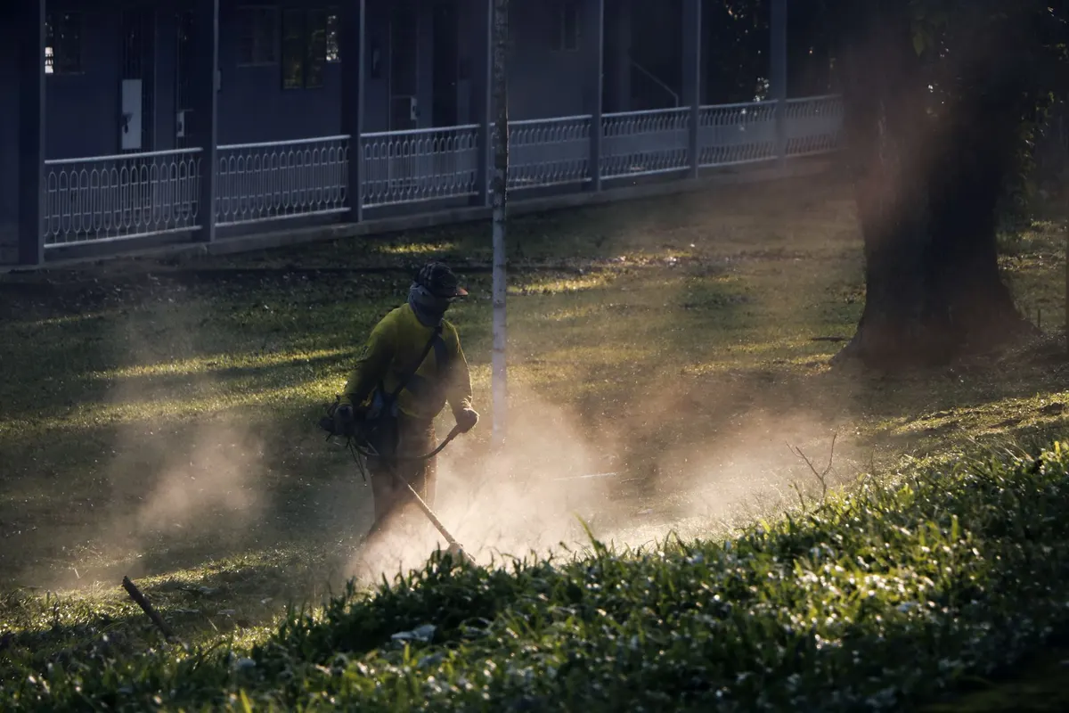 Grass cutting on a residential lawn in North Liberty, Iowa