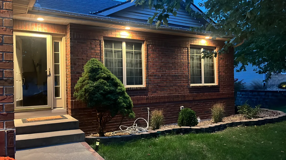 Front yard and lawn of a home after landscaping in North Liberty, Iowa