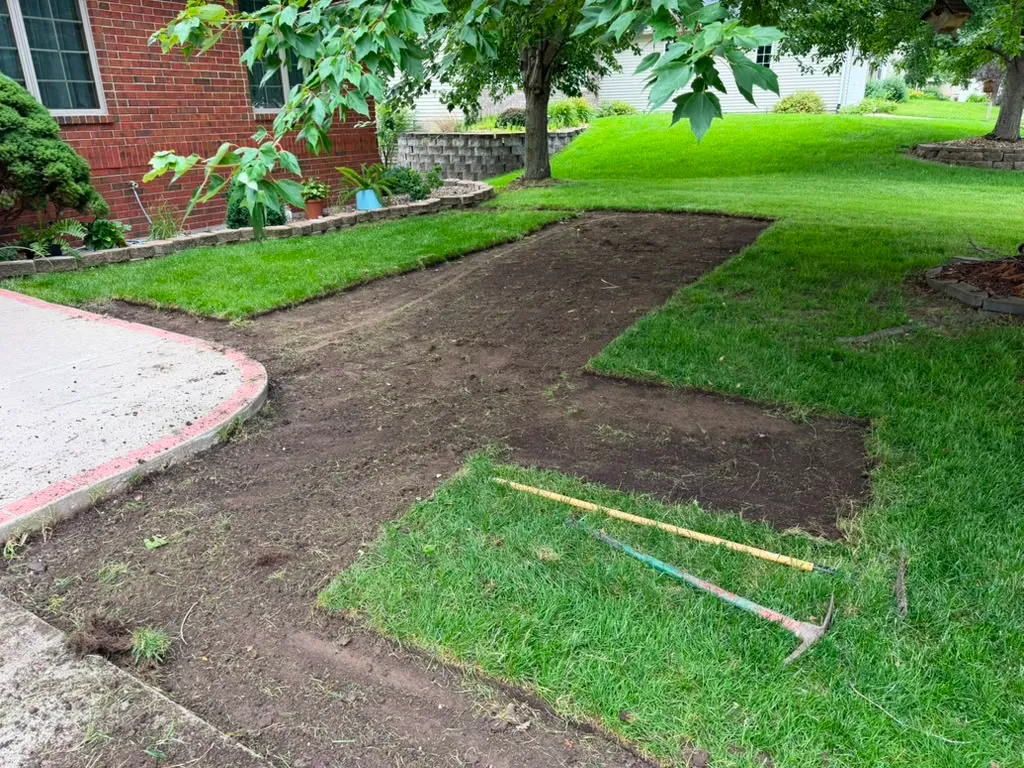 Old turf removed before sod installation in North Liberty, Iowa