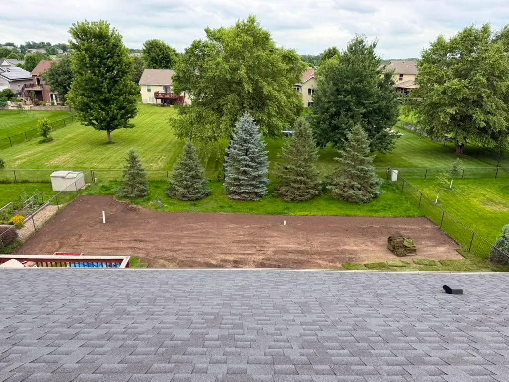 Backyard graded and prepped for sod installation in North Liberty, Iowa